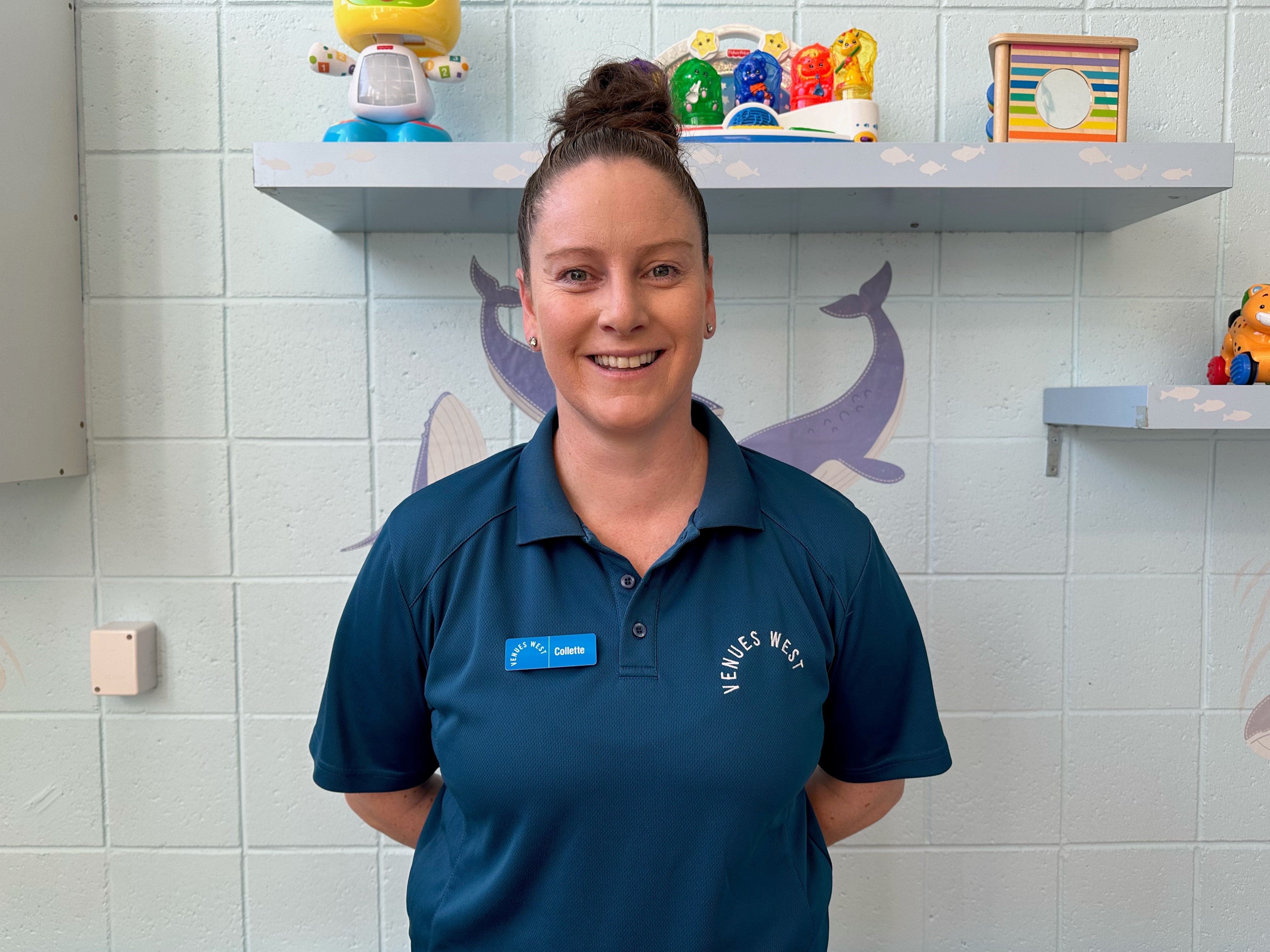 A photo of a VenuesWest creche employee