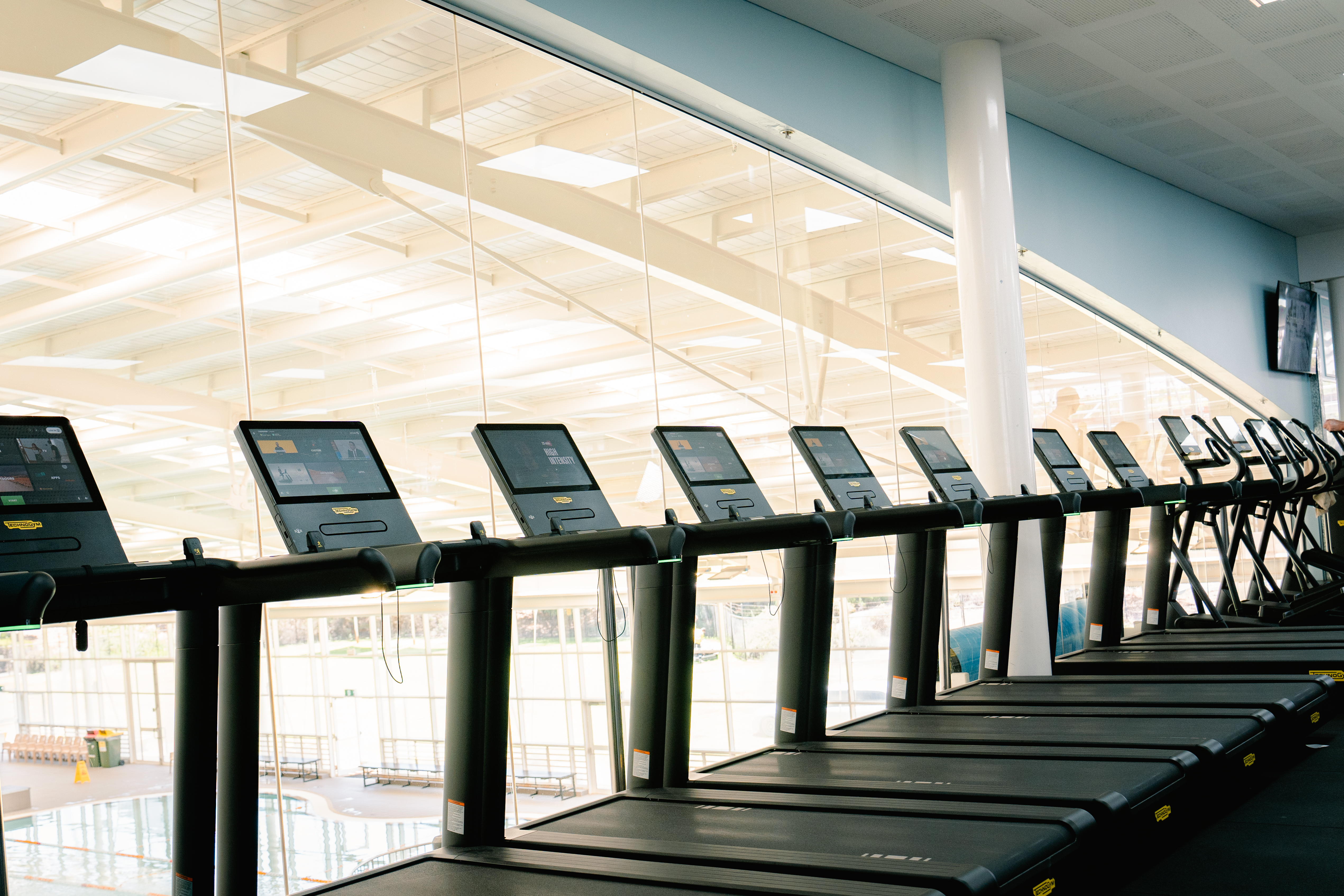 A photo of several treadmills