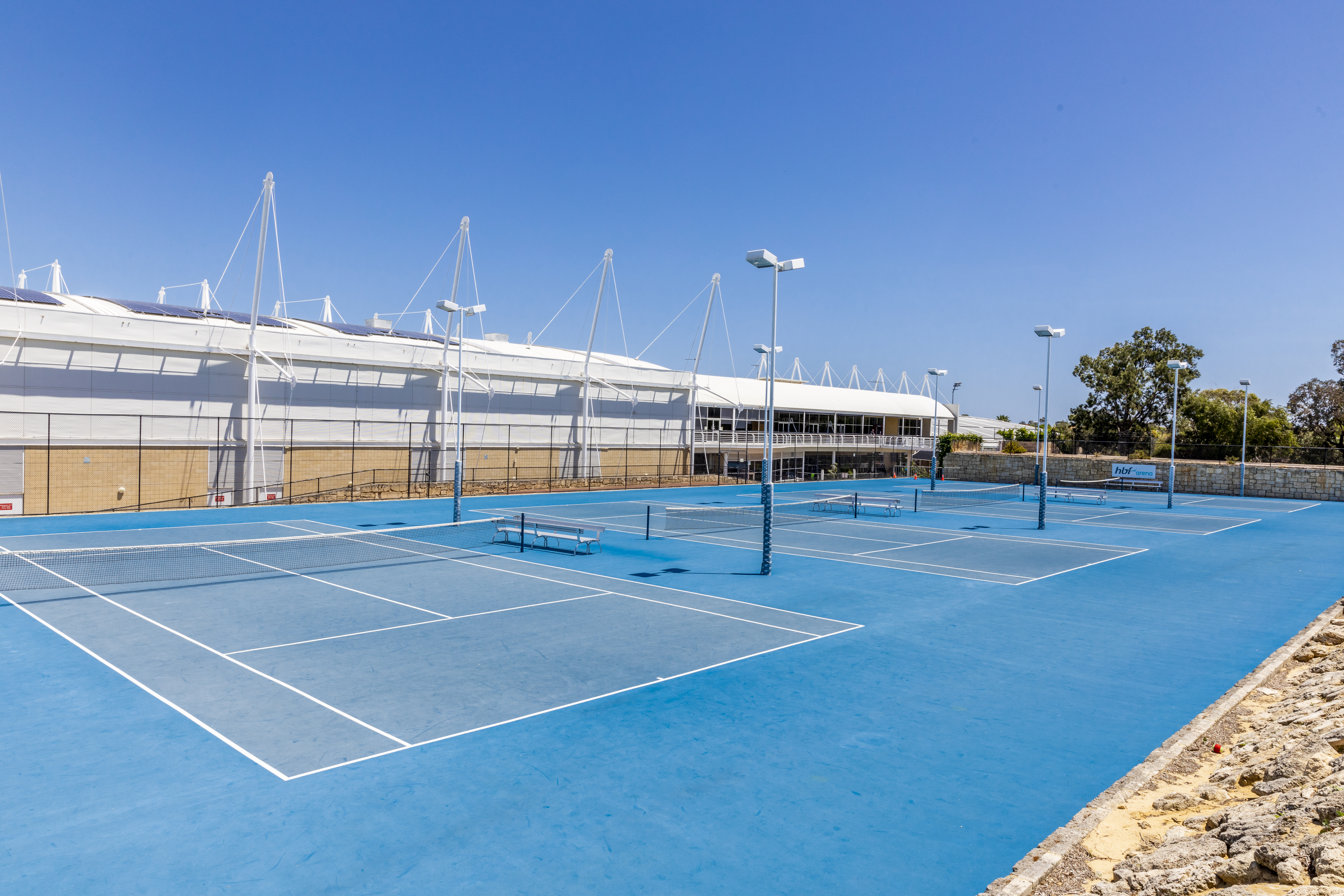 Multiple outdoor tennis courts